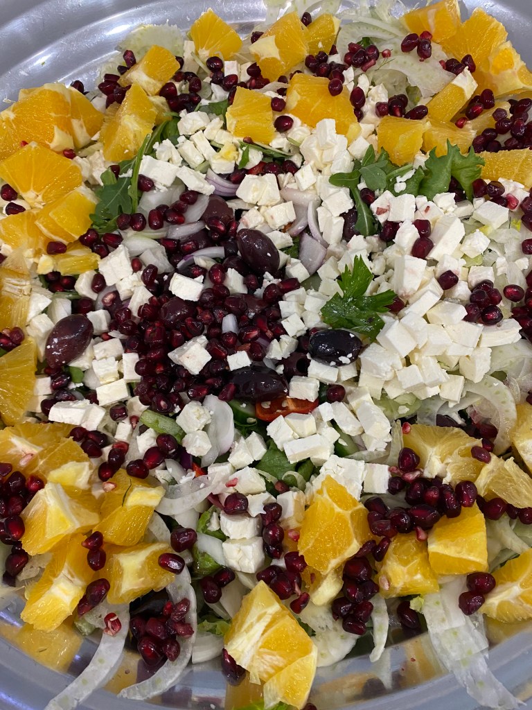 Arugula, Fennell and Orange salad in big bowl chopped up finely 