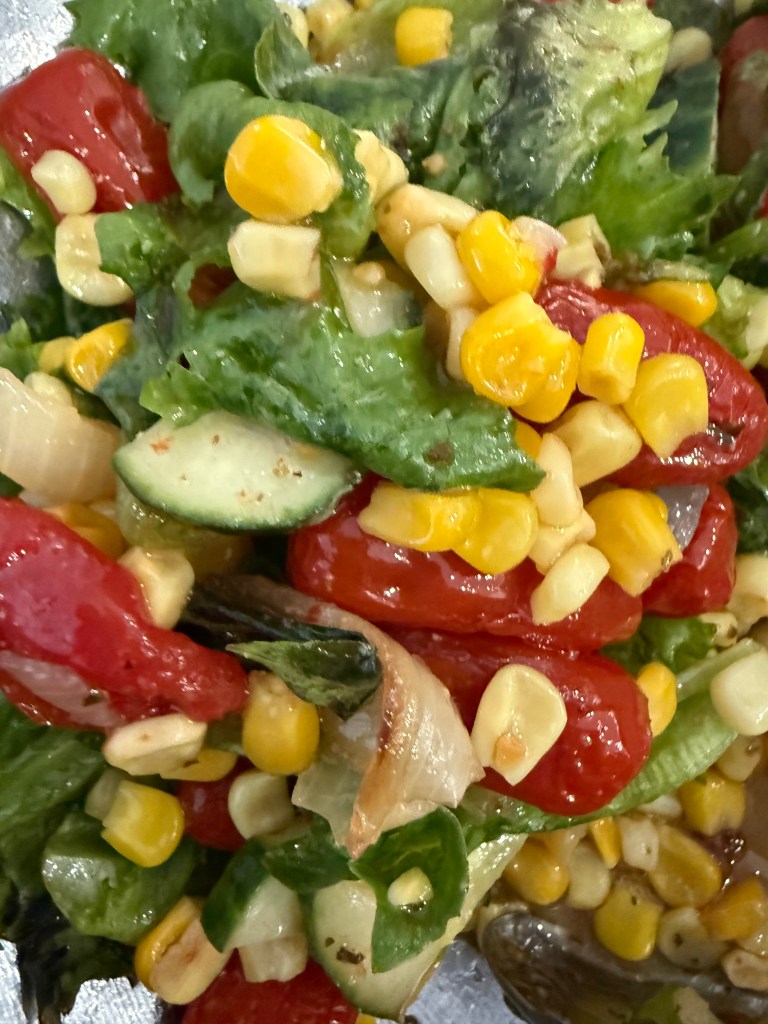 Roasted Vegetable salad with grilled onions tomatoes and corn 